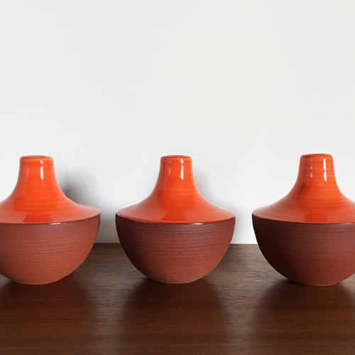Handmade vases in a variety of bright glaze colors, complement mid-century modern decor. 3 to 12 inches tall, terra cotta or white stoneware, pottery decor.